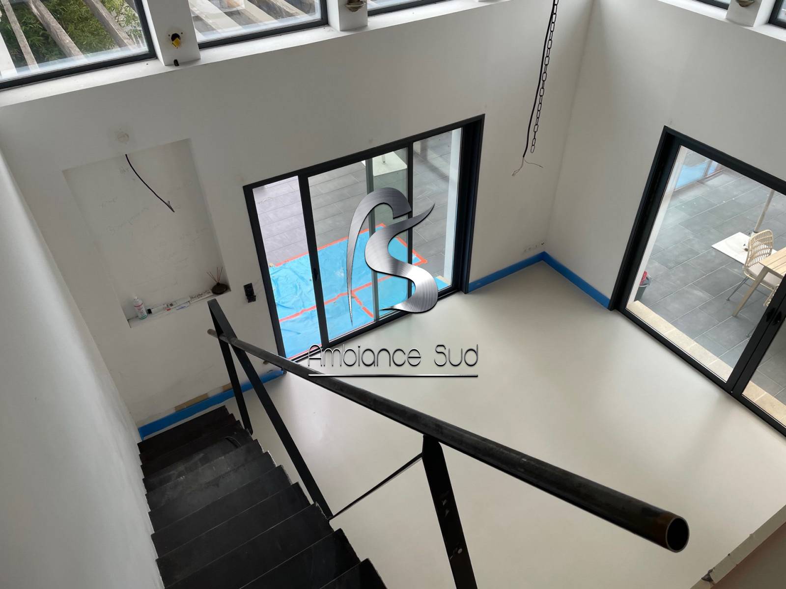 Sol en béton cire coulé décoratif à Aigues mortes